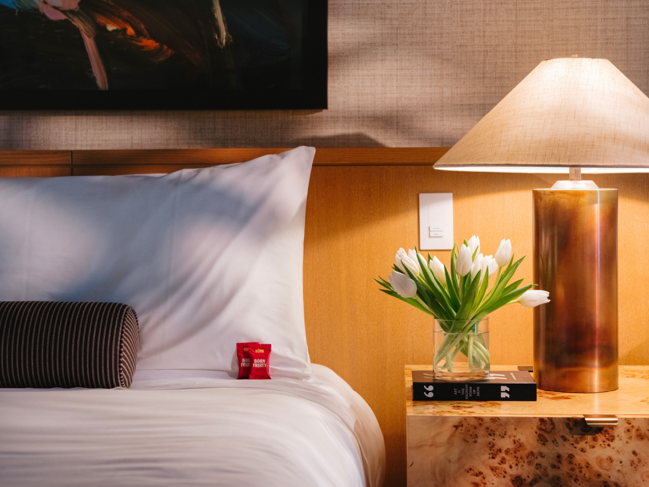 Bedside table in a Deluxe King room at 21c Bentonville