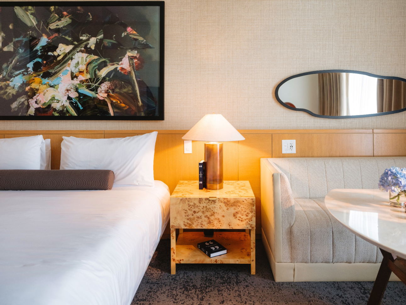 Couch and table in a Luxury King renovated room at 21c Bentonville