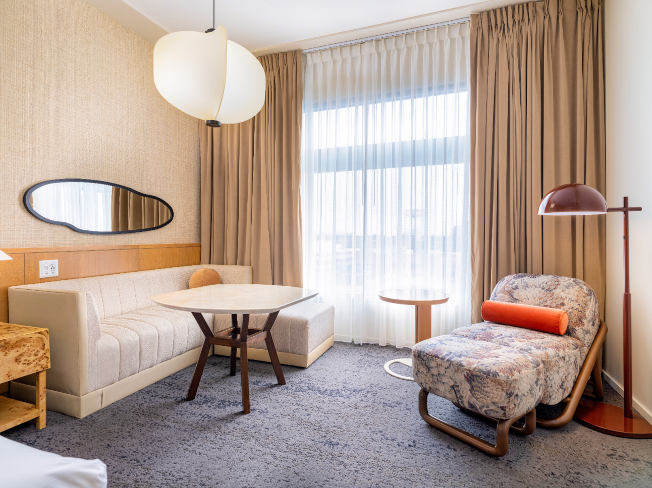 Couch and table in a Deluxe King room at 21c Bentonville