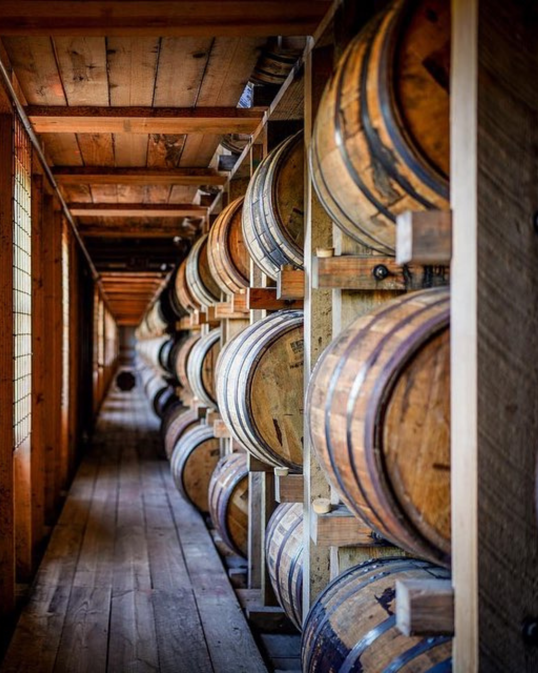 Stacked bourbon barrels on The Kentucky Bourbon Trail