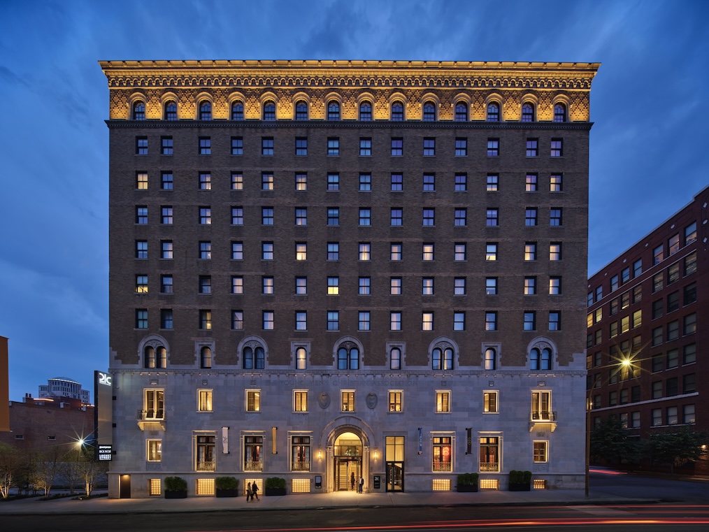 Large building lit up in the night time