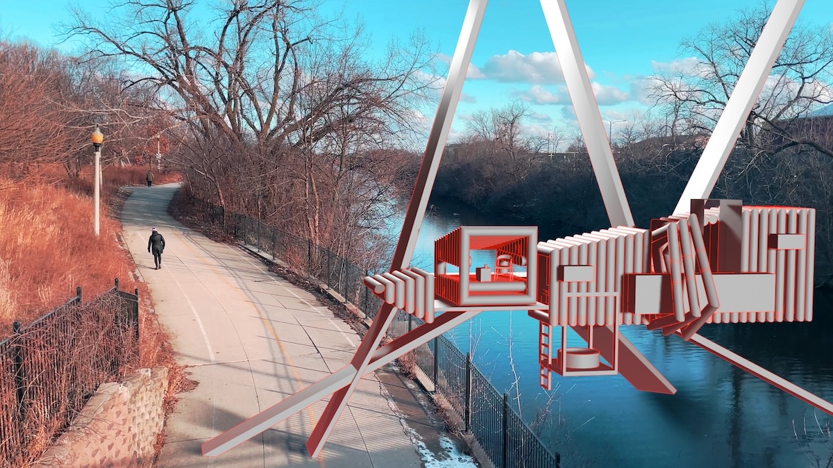 A large metal structure on a walkway near a river