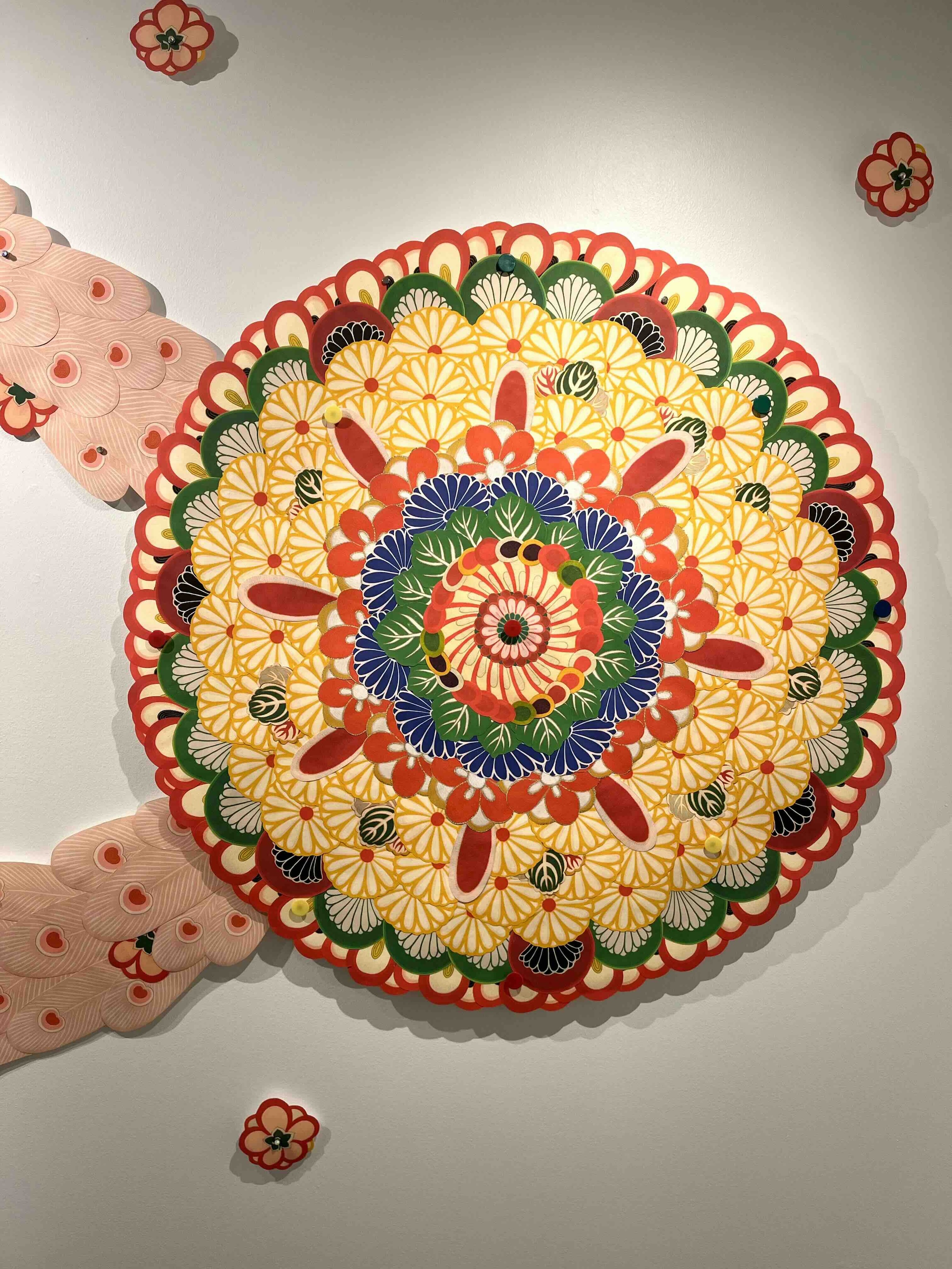 Colorful floral artwork on a white wall