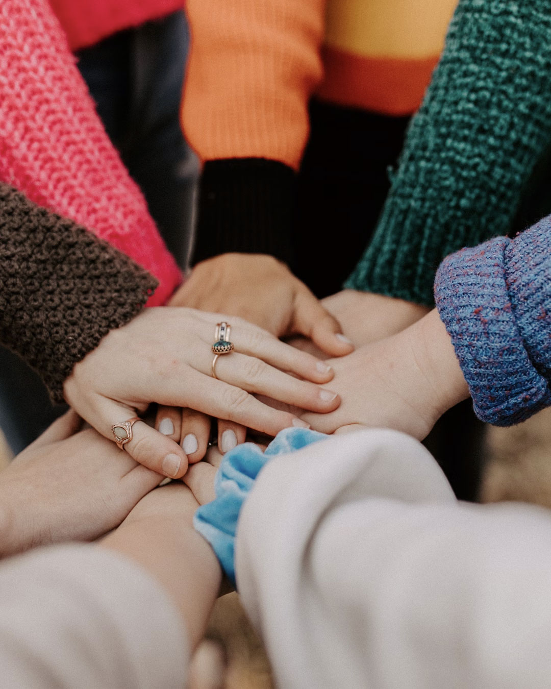 A group of people uniting hands