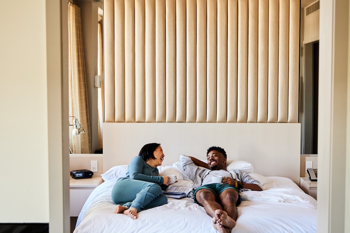 Couple laying in bed